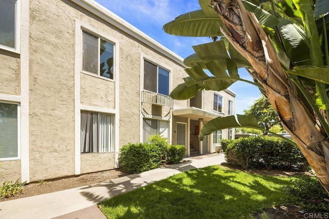 1240 N Broadway Unit 30, Escondido, CA 92026 - view of front of house with stucco siding and a front yard