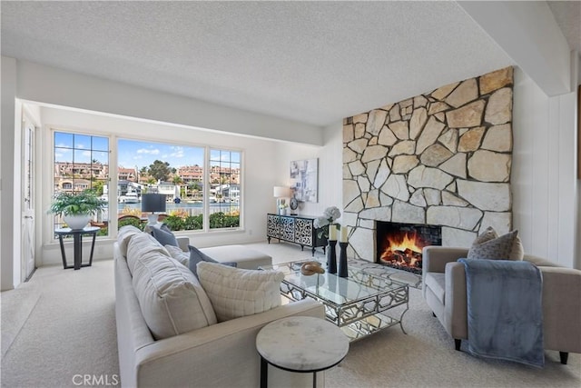 612 Harbor Island Dr, Newport Beach, CA 92660 - carpeted living area featuring a textured ceiling and a fireplace