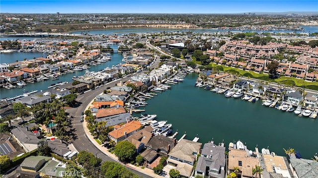 612 Harbor Island Dr, Newport Beach, CA 92660 - aerial view of property and surrounding area featuring a marina and a nearby body of water