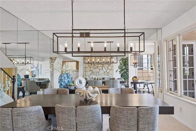 612 Harbor Island Dr, Newport Beach, CA 92660 - dining room with a chandelier, carpet floors, and a textured ceiling
