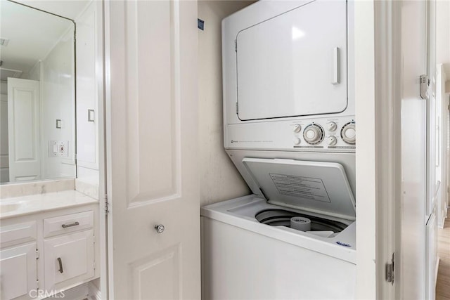 13300 Twin Hills Dr Unit 46A, Seal Beach, CA 90720 - laundry area featuring stacked washer and clothes dryer