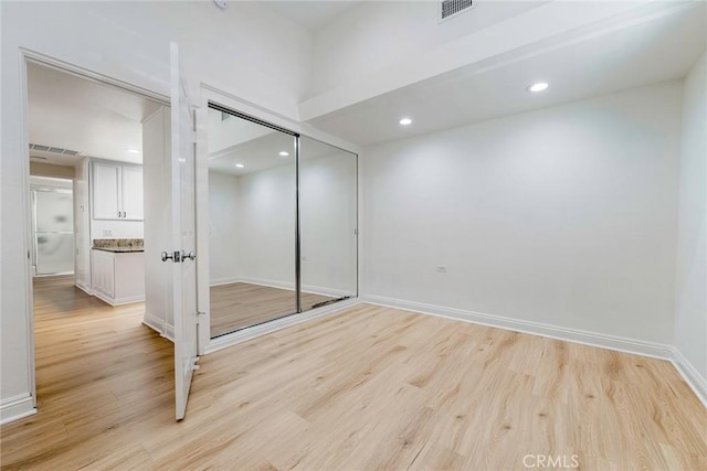 13300 Twin Hills Dr Unit 46A, Seal Beach, CA 90720 - empty room featuring light wood-style floors and recessed lighting