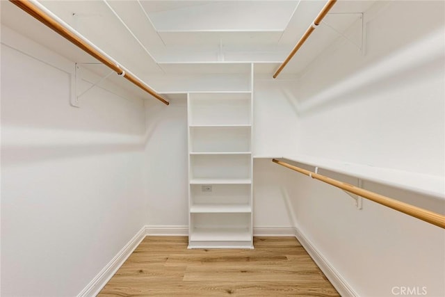13300 Twin Hills Dr Unit 46A, Seal Beach, CA 90720 - walk in closet with light wood finished floors