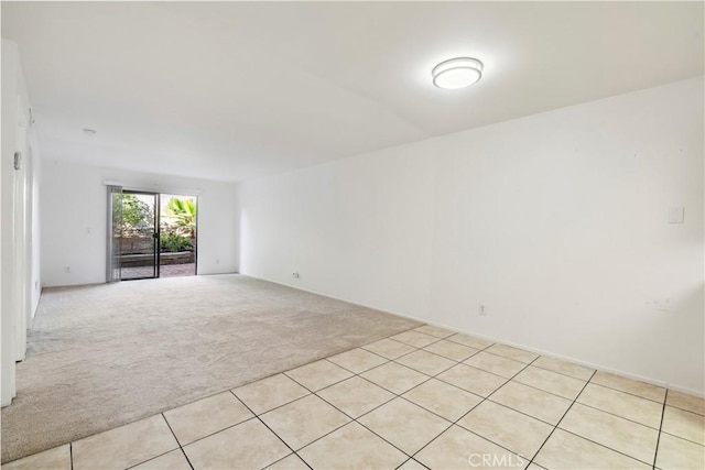 1745 Los Feliz Dr Unit 2, Thousand Oaks, CA 91362 - unfurnished room with light carpet and light tile patterned flooring