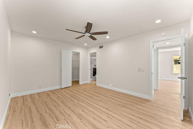 9866 Lido Way Unit 20, Cypress, CA 90630 - spare room with light wood-style flooring, ceiling fan, and recessed lighting
