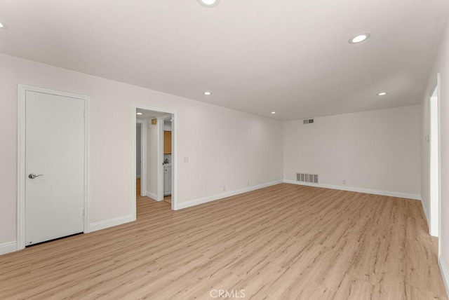 9866 Lido Way Unit 20, Cypress, CA 90630 - unfurnished room featuring recessed lighting and light wood-style flooring
