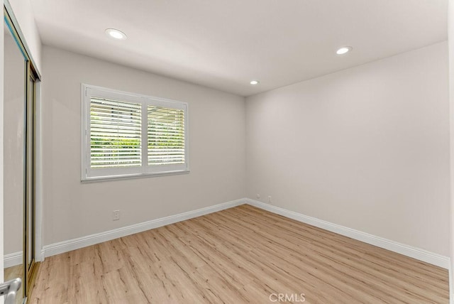 9866 Lido Way Unit 20, Cypress, CA 90630 - unfurnished room featuring light wood-style flooring and recessed lighting
