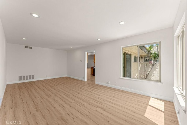 9866 Lido Way Unit 20, Cypress, CA 90630 - spare room featuring light wood-type flooring and recessed lighting