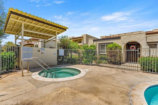 9866 Lido Way Unit 20, Cypress, CA 90630 - view of pool with a hot tub