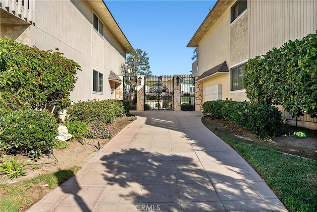 1200 Opal St Unit 7, Redondo Beach, CA 90277 - view of community with a gate, concrete driveway, and a garage