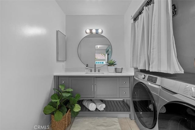 1200 Opal St Unit 7, Redondo Beach, CA 90277 - bathroom with washing machine and clothes dryer, vanity, and tile patterned flooring
