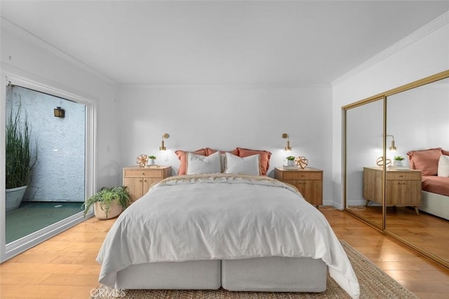 1200 Opal St Unit 7, Redondo Beach, CA 90277 - bedroom with ornamental molding, light wood finished floors, and access to outside
