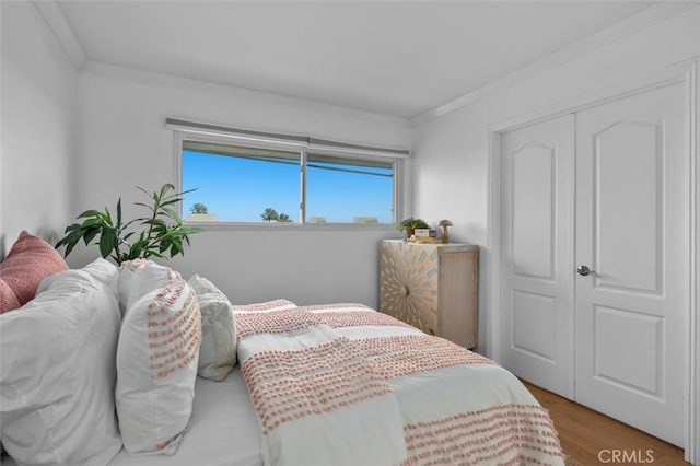 1200 Opal St Unit 7, Redondo Beach, CA 90277 - bedroom with crown molding, wood finished floors, and a closet
