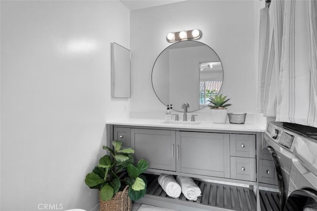 1200 Opal St Unit 7, Redondo Beach, CA 90277 - bathroom with vanity and washing machine and clothes dryer