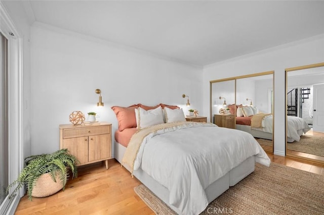 1200 Opal St Unit 7, Redondo Beach, CA 90277 - bedroom featuring crown molding and light wood finished floors