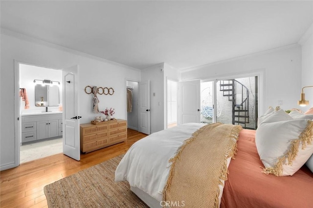 1200 Opal St Unit 7, Redondo Beach, CA 90277 - bedroom with crown molding, light wood-style flooring, access to outside, and ensuite bath