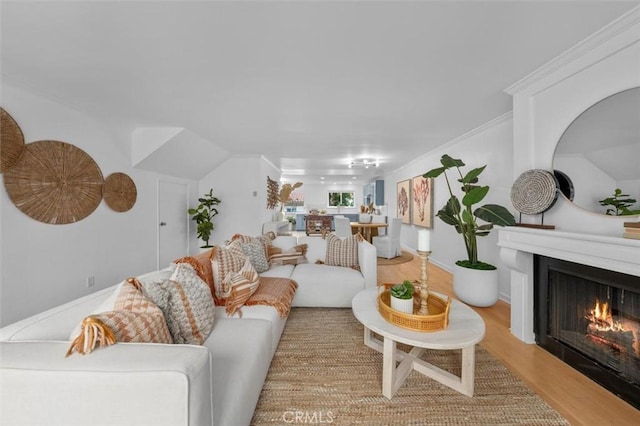 1200 Opal St Unit 7, Redondo Beach, CA 90277 - living area featuring light wood finished floors and a warm lit fireplace