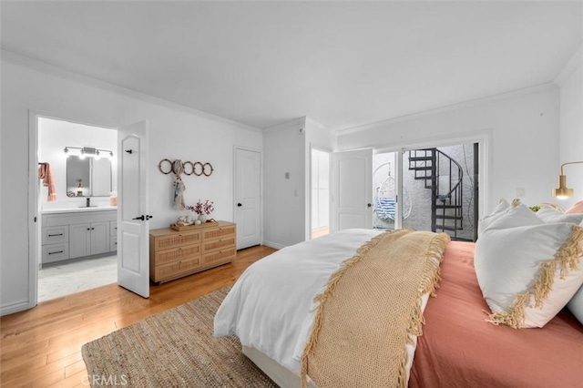 1200 Opal St Unit 7, Redondo Beach, CA 90277 - bedroom with ornamental molding, light wood-style floors, ensuite bath, and access to outside