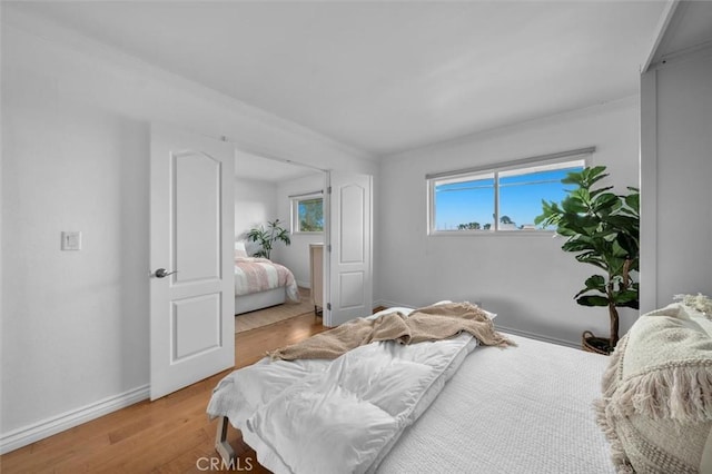 1200 Opal St Unit 7, Redondo Beach, CA 90277 - bedroom featuring wood finished floors and baseboards