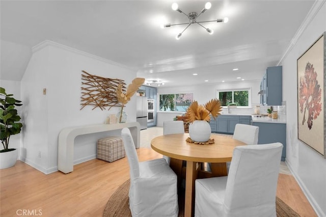1200 Opal St Unit 7, Redondo Beach, CA 90277 - dining space featuring a chandelier, light wood finished floors, ornamental molding, and recessed lighting