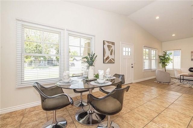 4158 Larchwood Pl, Riverside, CA 92506 - dining room featuring lofted ceiling, light tile patterned floors, and recessed lighting