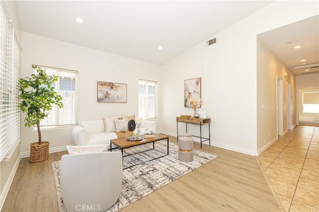 4158 Larchwood Pl, Riverside, CA 92506 - living area featuring wood finished floors, healthy amount of natural light, and recessed lighting