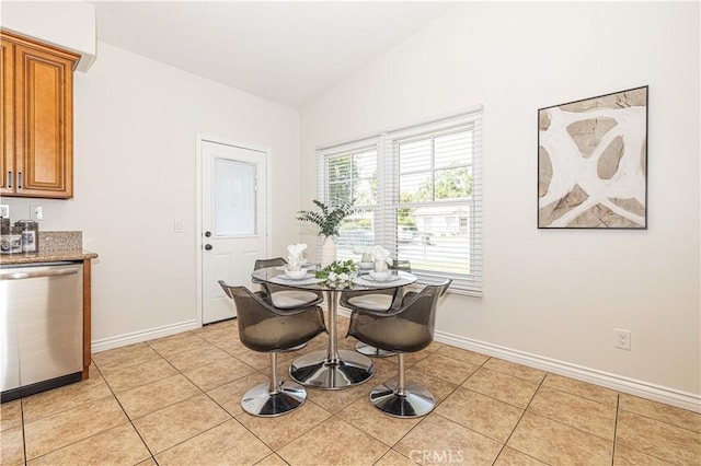 4158 Larchwood Pl, Riverside, CA 92506 - dining area with light tile patterned flooring and vaulted ceiling