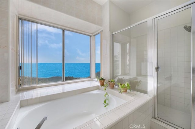 46 Saint Tropez, Laguna Niguel, CA 92677 - bathroom with a garden tub, a water view, and a shower stall