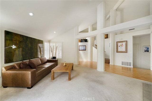 46 Saint Tropez, Laguna Niguel, CA 92677 - carpeted living room featuring high vaulted ceiling and recessed lighting