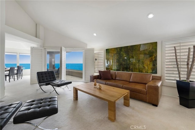 46 Saint Tropez, Laguna Niguel, CA 92677 - living room featuring carpet floors, a water view, recessed lighting, and high vaulted ceiling