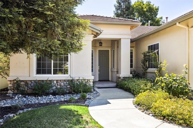 1044 Sleepy Hollow Rd, Paso Robles, CA 93446 - property entrance with stucco siding and a tile roof