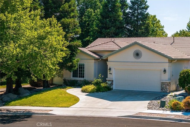1044 Sleepy Hollow Rd, Paso Robles, CA 93446 - ranch-style house featuring stone siding, an attached garage, driveway, stucco siding, and a tile roof