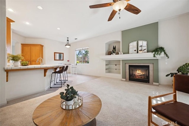 1044 Sleepy Hollow Rd, Paso Robles, CA 93446 - living room featuring light carpet, a fireplace, recessed lighting, and a ceiling fan