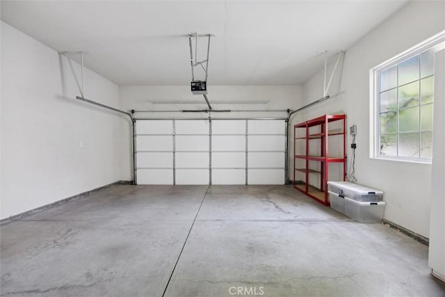 1044 Sleepy Hollow Rd, Paso Robles, CA 93446 - garage with baseboards and a garage door opener