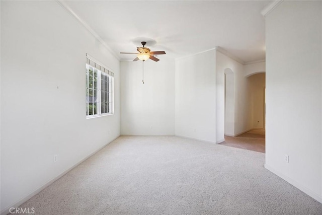 1044 Sleepy Hollow Rd, Paso Robles, CA 93446 - carpeted empty room featuring arched walkways, ornamental molding, and ceiling fan