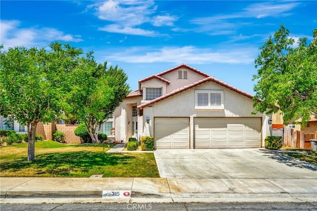 3115 Crowne Dr, Palmdale, CA 93551 - mediterranean / spanish-style home featuring driveway, stucco siding, a tiled roof, and an attached garage
