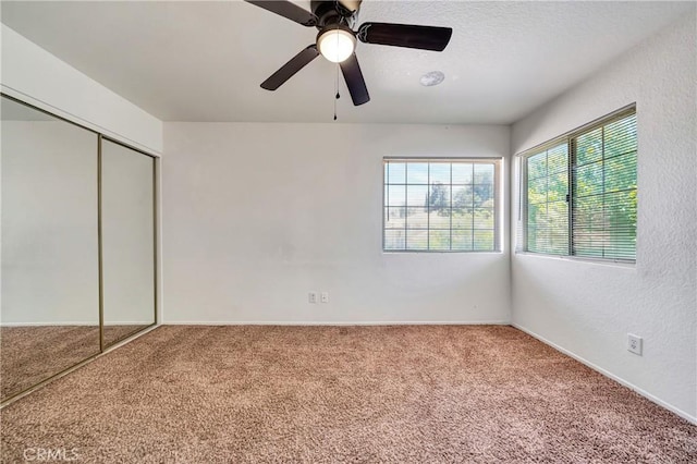 3115 Crowne Dr, Palmdale, CA 93551 - unfurnished bedroom with carpet floors, a closet, and ceiling fan