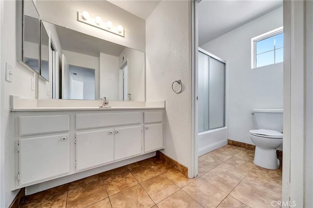 3115 Crowne Dr, Palmdale, CA 93551 - bathroom featuring vanity, enclosed tub / shower combo, and tile patterned floors