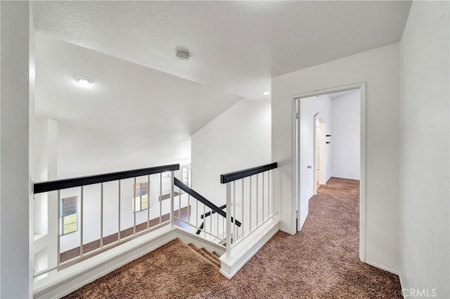 3115 Crowne Dr, Palmdale, CA 93551 - corridor featuring carpet flooring, an upstairs landing, and lofted ceiling