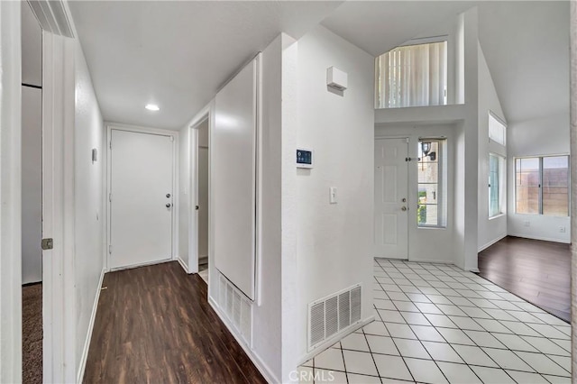 3115 Crowne Dr, Palmdale, CA 93551 - entrance foyer featuring wood finished floors, recessed lighting, and a towering ceiling