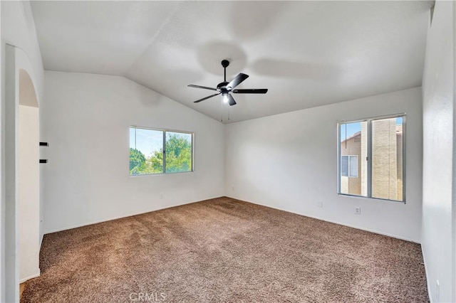 3115 Crowne Dr, Palmdale, CA 93551 - carpeted spare room with healthy amount of natural light, vaulted ceiling, and a ceiling fan