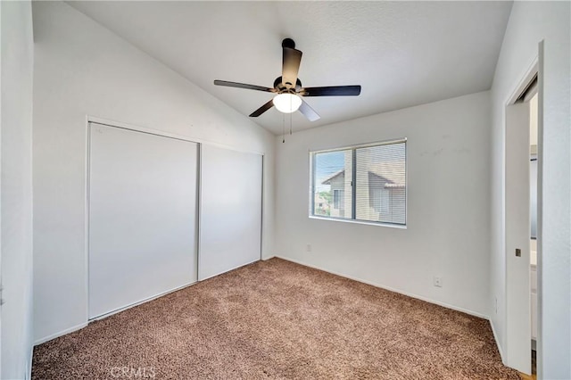 3115 Crowne Dr, Palmdale, CA 93551 - unfurnished bedroom featuring carpet floors, a closet, vaulted ceiling, and a ceiling fan