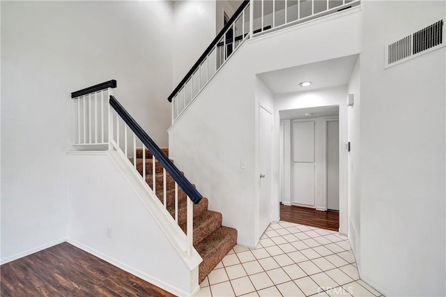 3115 Crowne Dr, Palmdale, CA 93551 - stairway featuring a high ceiling