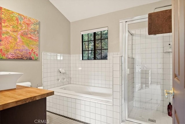 21658 W Buckthorne Dr, Cedarpines Park, CA 92322 - bathroom with a bath, vanity, a stall shower, tile patterned floors, and vaulted ceiling
