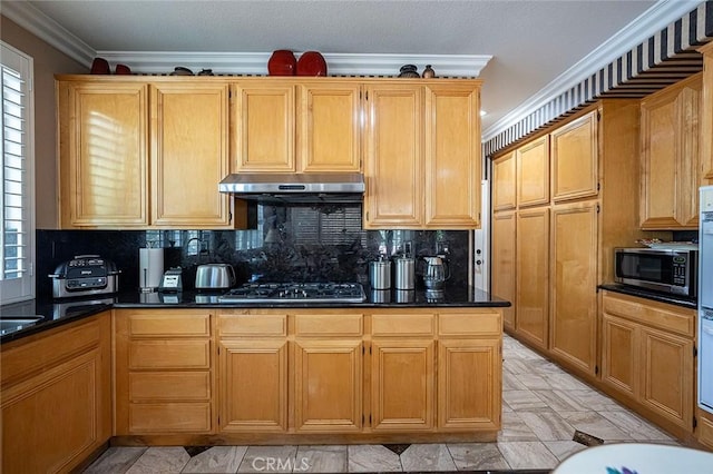 15075 Avenida Del Monte, Chino Hills, CA 91709 - kitchen featuring stainless steel gas stovetop, under cabinet range hood, tasteful backsplash, and crown molding