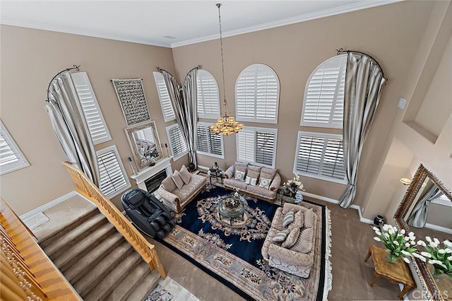 15075 Avenida Del Monte, Chino Hills, CA 91709 - carpeted living area featuring a chandelier, a high ceiling, and ornamental molding