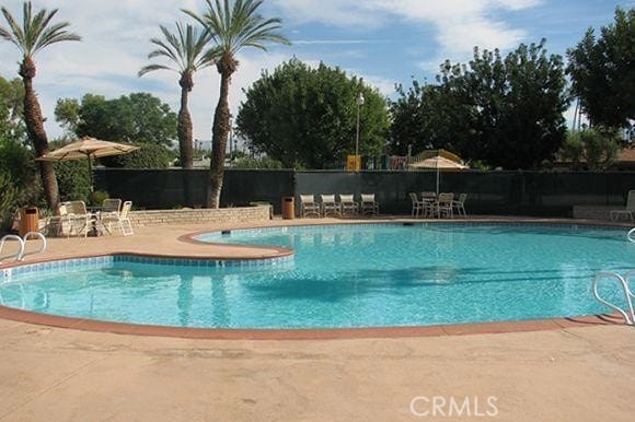 43340 Illinois, Palm Desert, CA 92211 - community pool with a patio area