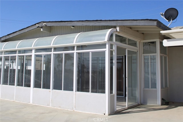43340 Illinois, Palm Desert, CA 92211 - view of side of property with a sunroom