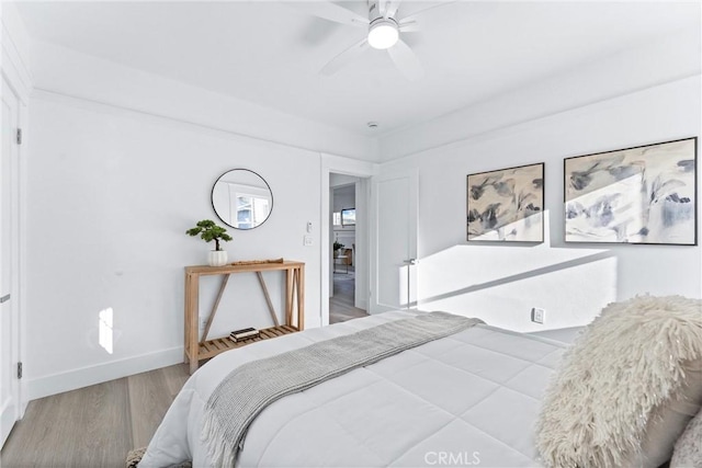 765 Loma Ave Unit 769, Long Beach, CA 90804 - bedroom with wood finished floors and a ceiling fan