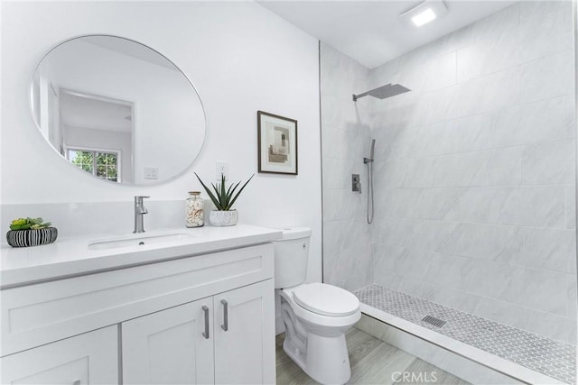 765 Loma Ave Unit 769, Long Beach, CA 90804 - full bath featuring a tile shower, vanity, and wood finished floors